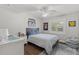 Well-lit bedroom featuring a window, desk, and neutral tones at 1285 Seminole Ave, Longwood, FL 32750