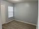 Bright bedroom features a closet and a window for natural light at 2020 Royal Bay Blvd # 92, Kissimmee, FL 34746