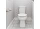 Powder room with white toilet, gray walls, and stylish fixtures at 2258 Ardon Ave, Orlando, FL 32833