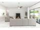 Bright living room featuring tile floors, a ceiling fan, and a sliding glass door to a patio at 2258 Ardon Ave, Orlando, FL 32833