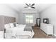 Comfortable main bedroom with large bed, tray ceiling, and dresser at 2258 Ardon Ave, Orlando, FL 32833