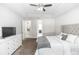 Comfortable main bedroom with large bed, tray ceiling, and dresser at 2258 Ardon Ave, Orlando, FL 32833