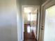 Hallway featuring wood floors and neutral colored walls at 2612 Robert Trent Jones Dr # 710, Orlando, FL 32835