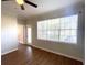 Bright living room with wood floors and a view of the outdoors at 2612 Robert Trent Jones Dr # 710, Orlando, FL 32835