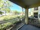 Relaxing screened patio area with beautiful outdoor scenery at 2612 Robert Trent Jones Dr # 710, Orlando, FL 32835