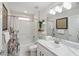 Bright bathroom featuring a shower/tub combo, neutral decor, and ample counter space at 2787 Lido Key Dr, Kissimmee, FL 34747