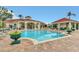 Resort-style community pool with ample lounge seating and a covered outdoor bar area at 2787 Lido Key Dr, Kissimmee, FL 34747