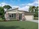 Inviting single-story home featuring stone accents, a two-car garage, and manicured landscaping at 3519 Evening Star Dr, Winter Haven, FL 33881