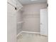 A walk-in closet featuring wire shelving and carpet at 4416 Shiva Loop, Kissimmee, FL 34746