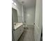 Compact bathroom featuring neutral colors and a tub/shower combination at 5111 Lake Hamlin Trl, Winter Garden, FL 34787