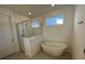 Bright bathroom featuring modern tub and shower with a glass enclosure at 5111 Lake Hamlin Trl, Winter Garden, FL 34787