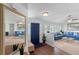 Welcoming foyer with a blue front door leading to a spacious living room at 516 Donaldson Dr, Debary, FL 32713