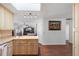 Open kitchen layout with granite countertops and adjacent living area, perfect for entertaining guests at 516 Donaldson Dr, Debary, FL 32713