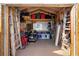 A well organized shed featuring tools and ladders for home projects at 516 Donaldson Dr, Debary, FL 32713