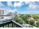 Breathtaking balcony view of the city skyline, lush greenery, and cityscape beyond at 530 E Central Blvd # 1901, Orlando, FL 32801