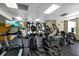 Community gym features modern treadmills, elliptical machines, and TV for resident convenience at 530 E Central Blvd # 1901, Orlando, FL 32801