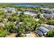 Overhead view showing the home's proximity to a lake and surrounding amenities at 651 Robinhood Dr, Maitland, FL 32751