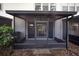 Enclosed patio with mesh screening and an overhead fan, offering a private outdoor space at 6847 Sperone St, Orlando, FL 32819