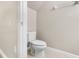 This toilet room has a standard toilet and tile flooring at 6847 Sperone St, Orlando, FL 32819