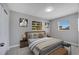 Serene bedroom featuring a comfortable bed, soft lighting, and tasteful decor for a relaxing retreat at 73 Garrison Ln, Frostproof, FL 33843