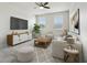 Well-lit living room featuring stylish furniture, modern decor, and a ceiling fan at 8433 Corkfield Ave, Orlando, FL 32832