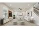 Inviting living room with contemporary furnishings, neutral colors, and large windows for natural light at 8433 Corkfield Ave, Orlando, FL 32832