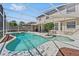 A stunning screened pool and spa offers a private backyard oasis at 848 Jadestone Cir, Orlando, FL 32828