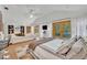 Spacious and open main bedroom featuring a seating area, en-suite bath, and French doors at 851 Georgia Ave, Winter Park, FL 32789