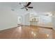 Spacious living room features hardwood floors, natural light, and an open layout at 8520 Rose Groves Rd, Orlando, FL 32818