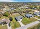 Aerial view of home and surrounding neighborhood with mature trees and lawns at 10367 Sw 45Th Ave, Ocala, FL 34476