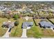 Aerial view of home and surrounding neighborhood with mature trees and lawns at 10367 Sw 45Th Ave, Ocala, FL 34476
