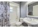 Cozy bathroom featuring a bathtub, shower and a white vanity with framed mirror at 10367 Sw 45Th Ave, Ocala, FL 34476