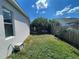 Lush backyard featuring healthy green grass and wooden privacy fence at 1352 Royal Saint George Dr, Orlando, FL 32828
