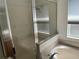 Bathroom featuring a shower, a bathtub, and a sink at 1352 Royal Saint George Dr, Orlando, FL 32828