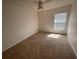 Cozy bedroom with carpet, ceiling fan, and window that allows natural light to fill the space at 1352 Royal Saint George Dr, Orlando, FL 32828