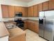Modern kitchen featuring stainless steel appliances, and plenty of cabinet space at 1352 Royal Saint George Dr, Orlando, FL 32828