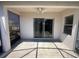 Enclosed patio with screen, ceiling fan, and sliding doors, making for a relaxing outdoor space at 1352 Royal Saint George Dr, Orlando, FL 32828