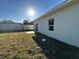 Exterior of home showcasing large, grassy backyard with new sod at 137 W G H Washington St, Apopka, FL 32703