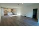 Expansive living room with open layout, recessed lighting, and easy access to the kitchen and other areas at 137 W G H Washington St, Apopka, FL 32703