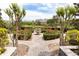 Manicured garden with a water fountain feature in a beautiful residential community at 14316 Fredricksburg Dr # 507, Orlando, FL 32837
