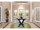 Well lit lobby with tile floors, pillars and decorative plants at 14316 Fredricksburg Dr # 507, Orlando, FL 32837