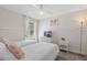 Bright bedroom featuring two twin beds and whimsical decor, perfect for a playful and inviting space at 1551 Flange Dr, Davenport, FL 33896