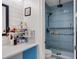 Bathroom boasting modern fixtures, including a walk-in shower and vanity with plenty of counter space at 15681 Panther Lake Dr, Winter Garden, FL 34787