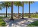 Relaxing hammock park with palm trees and sandy ground, providing a tranquil escape by the lake at 15681 Panther Lake Dr, Winter Garden, FL 34787