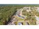Overhead view of a single Gathering home in a quiet neighborhood near lots of trees and houses at 17236 Sw 44Th Cir, Ocala, FL 34473