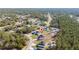 Aerial view of single Gathering home with a nice backyard in quiet neighborhood near green trees at 17236 Sw 44Th Cir, Ocala, FL 34473