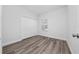 Cozy bedroom featuring closet and window at 17236 Sw 44Th Cir, Ocala, FL 34473