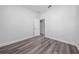 Bright bedroom featuring wood-look floors at 17236 Sw 44Th Cir, Ocala, FL 34473