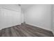 Neutral bedroom with a large closet and wood-look floors at 17236 Sw 44Th Cir, Ocala, FL 34473
