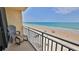 Relaxing condo balcony with seating and stunning ocean views at 2401 S Atlantic Ave # D306, New Smyrna Beach, FL 32169